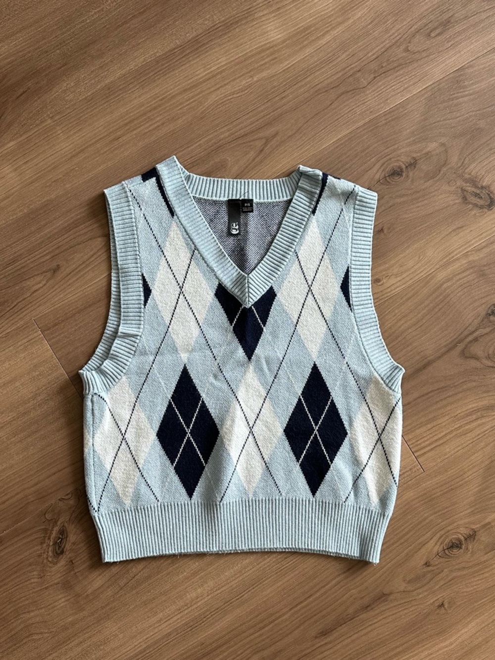 Blue sweater vest